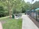 This community area includes picnic tables, grills and a pool, perfect for outdoor enjoyment at 609 Redford Place Dr, Rolesville, NC 27571