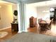 This dining room features both hardwood and carpet flooring, plus a large dining table at 609 Redford Place Dr, Rolesville, NC 27571