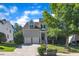 Charming two-story home featuring a two-car garage, manicured lawn, and inviting front porch, perfect for suburban living at 609 Redford Place Dr, Rolesville, NC 27571