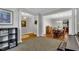 Open living room showcasing an adjacent dining area, perfect for entertaining and Gathering gatherings in a comfortable setting at 609 Redford Place Dr, Rolesville, NC 27571