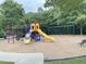 Colorful playground with slides and swings, offering a fun and safe environment for children to play at 609 Redford Place Dr, Rolesville, NC 27571