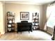 Sitting room with carpet, a piano, shelving and natural light at 609 Redford Place Dr, Rolesville, NC 27571