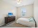 Cozy bedroom with neutral paint, carpet, and a comfortable queen size bed at 611 Ashbrittle Dr, Rolesville, NC 27571