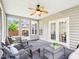 Covered outdoor sunroom area with lots of natural light, perfect for relaxing and entertaining at 611 Ashbrittle Dr, Rolesville, NC 27571