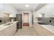 Galley kitchen with stainless steel appliances, modern cabinetry, and tiled backsplash at 620 Martin Luther King Jr. Blvd # 302, Chapel Hill, NC 27514