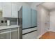Updated kitchen featuring stainless steel refrigerator, dishwasher, and tile backsplash at 620 Martin Luther King Jr. Blvd # 302, Chapel Hill, NC 27514