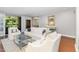 Cozy living room with ample seating, stylish decor, and a view of the outdoor balcony at 620 Martin Luther King Jr. Blvd # 302, Chapel Hill, NC 27514