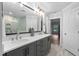 Beautiful bathroom featuring double sinks, a modern shower, and elegant finishes at 623 Cabin Crk, Pittsboro, NC 27312