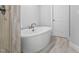 Relaxing bathroom featuring a sleek soaking tub and modern fixtures at 623 Cabin Crk, Pittsboro, NC 27312