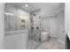 Modern bathroom with a glass-enclosed shower and a soaking tub for relaxation at 623 Cabin Crk, Pittsboro, NC 27312