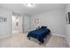 Relaxing bedroom with neutral walls, carpet and comfortable bed with natural light at 623 Cabin Crk, Pittsboro, NC 27312