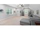 Spacious bonus room with neutral tones, cozy carpet, and a ceiling fan at 623 Cabin Crk, Pittsboro, NC 27312
