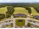Expansive aerial view of the clubhouse and expansive parking lot at 623 Cabin Crk, Pittsboro, NC 27312