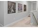Well-lit hallway with neutral tones, perfect for displaying artwork at 623 Cabin Crk, Pittsboro, NC 27312