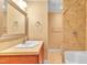 Bathroom featuring a sink, neutral paint, and a shower/tub combo at 6423 New Market Way, Raleigh, NC 27615