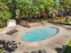 Inviting community pool deck with lounge chairs offering a serene escape for residents to enjoy at 6423 New Market Way, Raleigh, NC 27615
