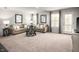 Comfortable living room with neutral decor, large windows, and plush seating at 704 Blazer Bnd, Wendell, NC 27591