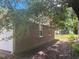 Side view of house and yard at 708 Old Barn Ave, Durham, NC 27704