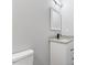 Modern bathroom featuring granite countertops, a sleek sink, and stylish fixtures at 714 Harriett St, Henderson, NC 27536