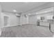 Bright living space with vinyl floors and seamless transition to the kitchen area at 714 Harriett St, Henderson, NC 27536
