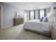 Comfortable main bedroom with soft carpet, neutral decor, and ample natural light at 716 Blazer Bnd, Wendell, NC 27591