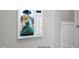 Smart panel on the wall featuring a photo of a dog at 72 Merle Way, Wendell, NC 27591