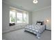 Cozy bedroom with a window seat, lots of natural light, and neutral carpeting at 7736 Roberts Rd, Apex, NC 27523