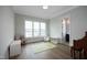 Light-filled bonus room with hardwood floors and cheerful play area at 7736 Roberts Rd, Apex, NC 27523