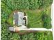 Top-down aerial view of the home with a long, concrete driveway and manicured lawn at 85 Pebble Creek Dr, Franklinton, NC 27525