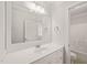 Bathroom features a large mirror, vanity with storage, and a shower/tub combo at 85 Pebble Creek Dr, Franklinton, NC 27525