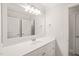 Bathroom features a large mirror, vanity with storage, and a shower/tub combo at 85 Pebble Creek Dr, Franklinton, NC 27525