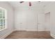 Bedroom features hardwood floors, double closets, and a ceiling fan at 85 Pebble Creek Dr, Franklinton, NC 27525