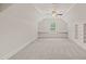 Bonus room with carpet, built-in shelves, and a window with blinds at 85 Pebble Creek Dr, Franklinton, NC 27525