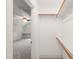 Walk-in closet with shelving and hanging racks at 85 Pebble Creek Dr, Franklinton, NC 27525