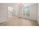 Formal dining room with hardwood floors, and large window letting in lots of light at 85 Pebble Creek Dr, Franklinton, NC 27525