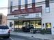 Owl's Roost Brewery entrance with outdoor seating, modern design, and ample street parking at 85 Pebble Creek Dr, Franklinton, NC 27525