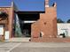 Unique brick building with outdoor patio featuring colorful mural and inviting open space at 85 Pebble Creek Dr, Franklinton, NC 27525