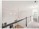Hallway with hardwood floors below and carpet above at 85 Pebble Creek Dr, Franklinton, NC 27525