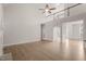 Open-concept living space featuring hardwood floors, high ceilings and a wrought iron railing at 85 Pebble Creek Dr, Franklinton, NC 27525