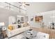 Spacious living room with hardwood floors, a comfortable sofa, and an open layout at 85 Pebble Creek Dr, Franklinton, NC 27525