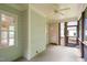 Relaxing screened-in porch with ceiling fan and natural light at 85 Pebble Creek Dr, Franklinton, NC 27525