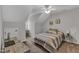 Cozy bedroom features unique ceiling architecture, a ceiling fan, and carpeted floors at 8611 London Park Ct, Raleigh, NC 27615