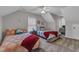 Bedroom features two beds, carpet, and a ceiling fan at 8611 London Park Ct, Raleigh, NC 27615