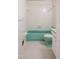 Retro bathroom with turquoise fixtures and tile at 1002 Willow Drive Dr # 37, Chapel Hill, NC 27514