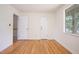 Empty bedroom featuring hardwood floors, bright natural light, and neutral walls at 1002 Willow Drive Dr # 37, Chapel Hill, NC 27514
