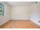 Bright bedroom with parquet floors and a large window at 1002 Willow Drive Dr # 37, Chapel Hill, NC 27514