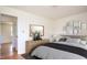 Cozy bedroom featuring neutral tones, stylish decor, and hardwood flooring at 1002 Willow Drive Dr # 37, Chapel Hill, NC 27514