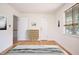 Bright bedroom featuring neutral walls, natural light, and beautiful hardwood floors at 1002 Willow Drive Dr # 37, Chapel Hill, NC 27514