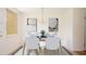 Stylized dining room with decor and table set for a dinner party at 1002 Willow Drive Dr # 37, Chapel Hill, NC 27514