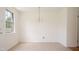Bright dining room with a window, chandelier and hardwood floors at 1002 Willow Drive Dr # 37, Chapel Hill, NC 27514